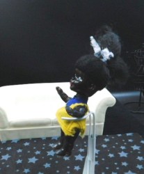 black doll yellow dress b